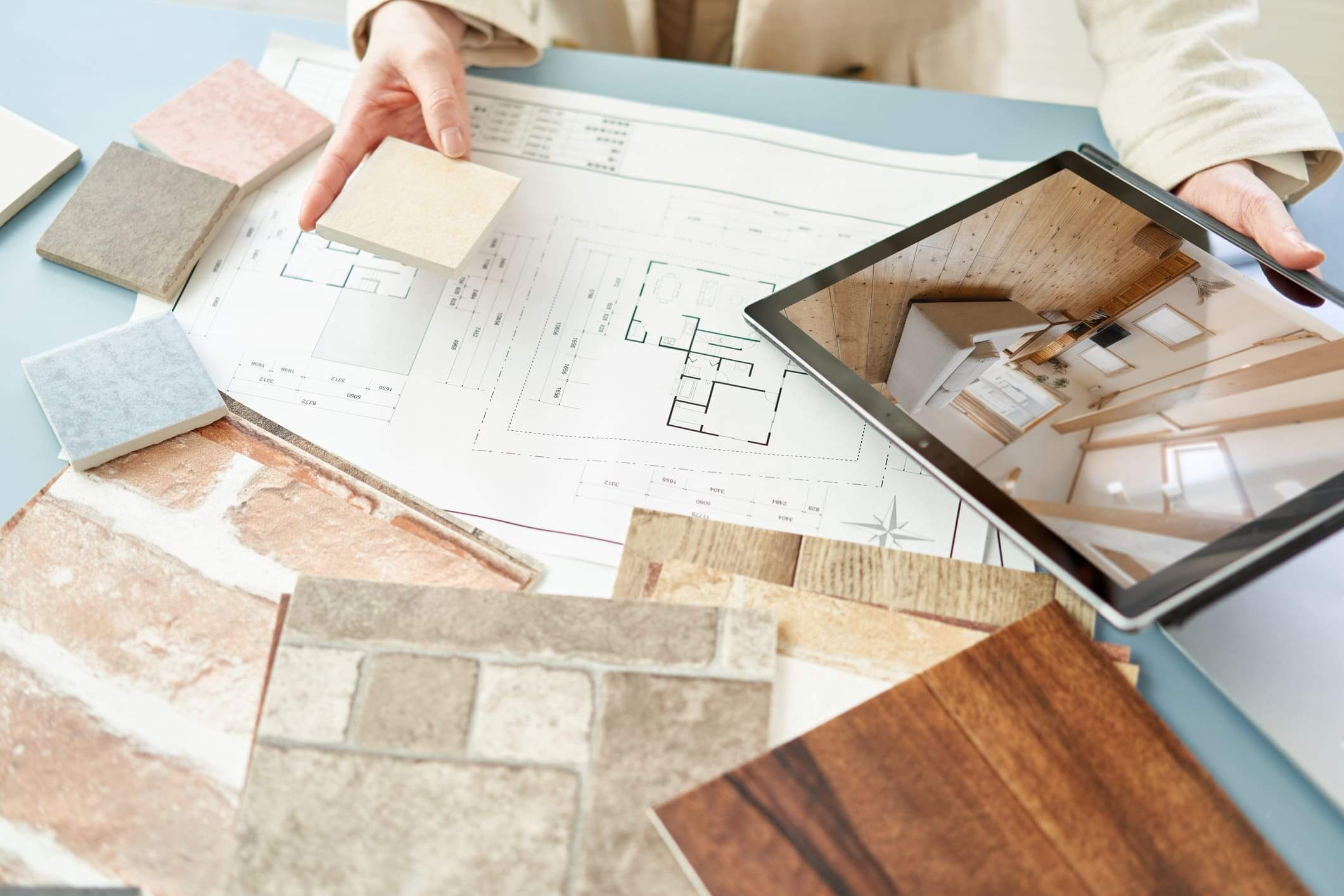 Architectural plans with various material samples.